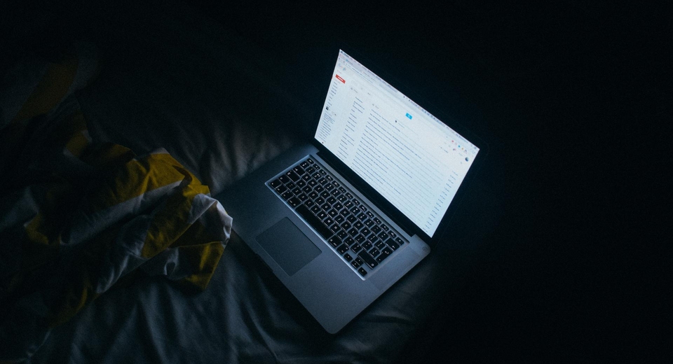 Laptop on the bed