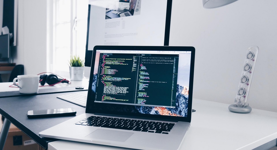 coding on laptop