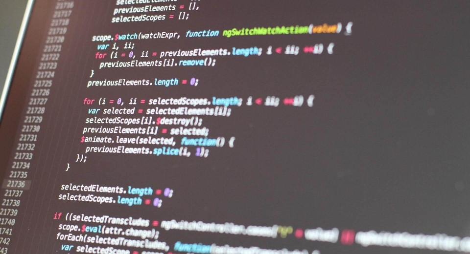 coding on laptop